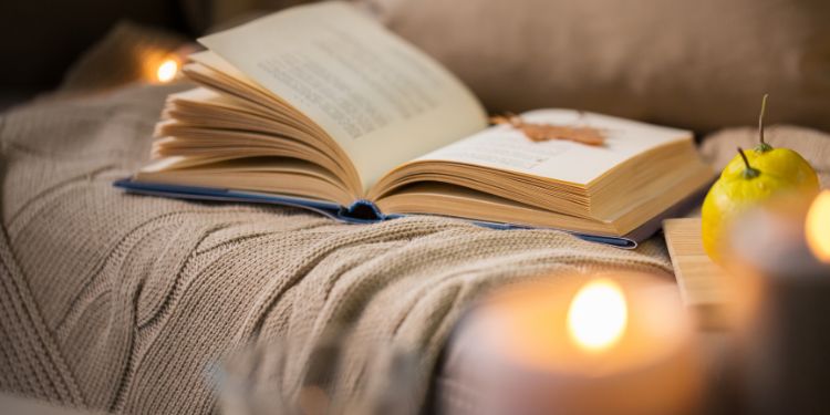 December-Retreat Cosy photo of a book and some candles